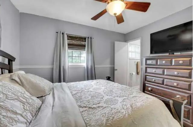 3093 SW Berry Ave, Palm City, FL 34990 - bedroom featuring a ceiling fan