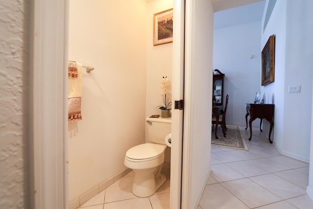 4245 Bluff Harbor Way, Wellington, FL 33449 - bathroom featuring toilet, tile patterned flooring, and baseboards