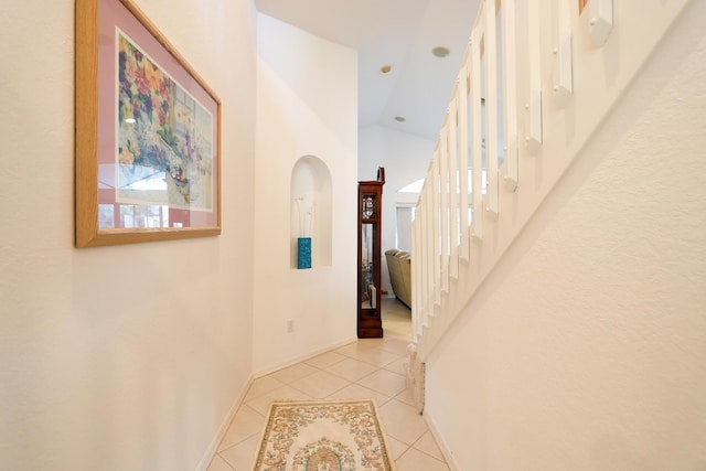 4245 Bluff Harbor Way, Wellington, FL 33449 - hall with tile patterned floors, stairway, and baseboards