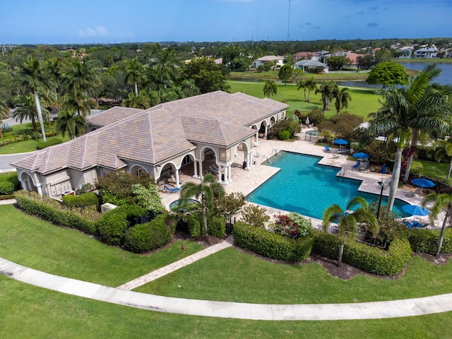 4245 Bluff Harbor Way, Wellington, FL 33449 - view of subject property featuring a pool area and a large body of water