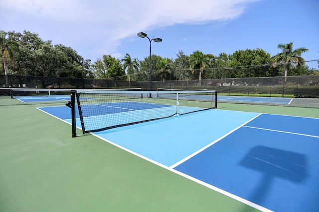 4245 Bluff Harbor Way, Wellington, FL 33449 - view of tennis court featuring community basketball court and view of scattered trees