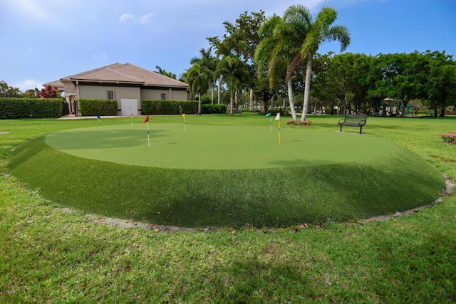 4245 Bluff Harbor Way, Wellington, FL 33449 - view of home's community with an area to practice putting and a yard