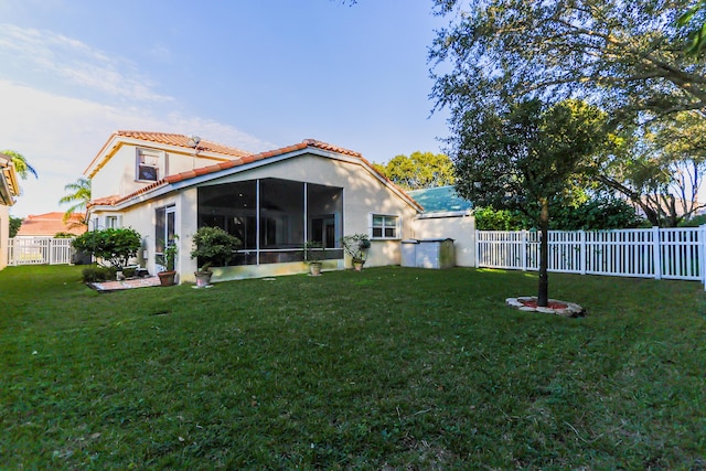 4245 Bluff Harbor Way, Wellington, FL 33449 - rear view of property featuring a sunroom, stucco siding, and a tiled roof