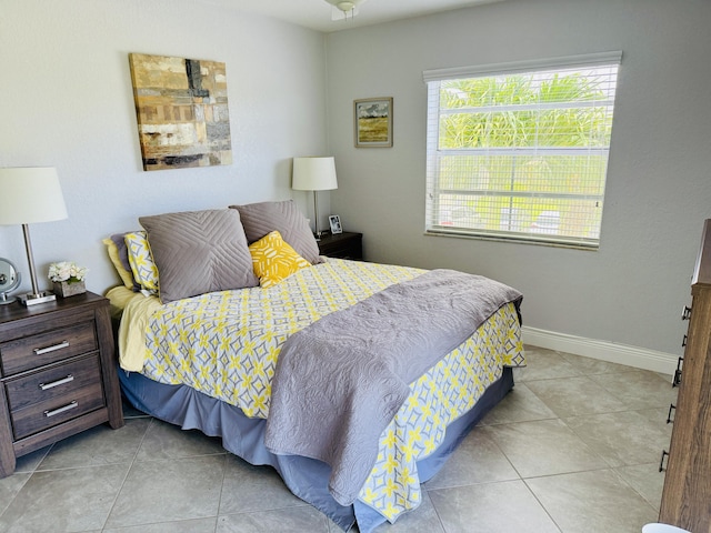 478 Capri J, Delray Beach, FL 33484 - bedroom featuring light tile patterned floors and baseboards