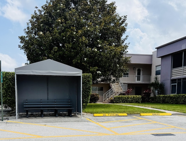 478 Capri J, Delray Beach, FL 33484 - view of home's community featuring stairs and uncovered parking