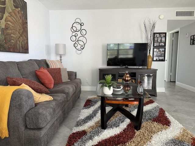 478 Capri J, Delray Beach, FL 33484 - living area featuring baseboards