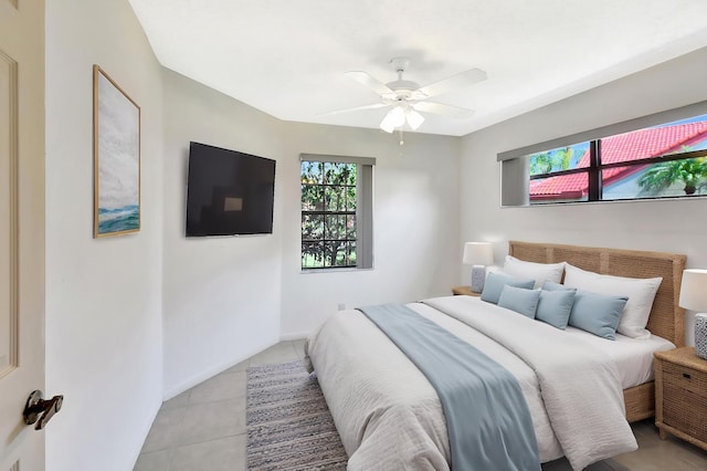 7644 Lexington Club Blvd Unit A, Delray Beach, FL 33446 - bedroom featuring light tile patterned flooring, ceiling fan, and baseboards