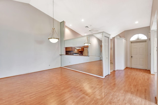 7644 Lexington Club Blvd Unit A, Delray Beach, FL 33446 - unfurnished living room with light wood-style floors, a ceiling fan, recessed lighting, and high vaulted ceiling