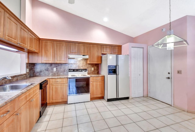 7644 Lexington Club Blvd Unit A, Delray Beach, FL 33446 - kitchen with white appliances, under cabinet range hood, a sink, tasteful backsplash, and light countertops