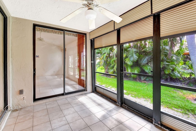 7644 Lexington Club Blvd Unit A, Delray Beach, FL 33446 - unfurnished sunroom with a ceiling fan