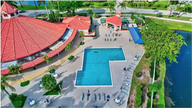 7644 Lexington Club Blvd Unit A, Delray Beach, FL 33446 - drone / aerial view of a pool and a nearby body of water