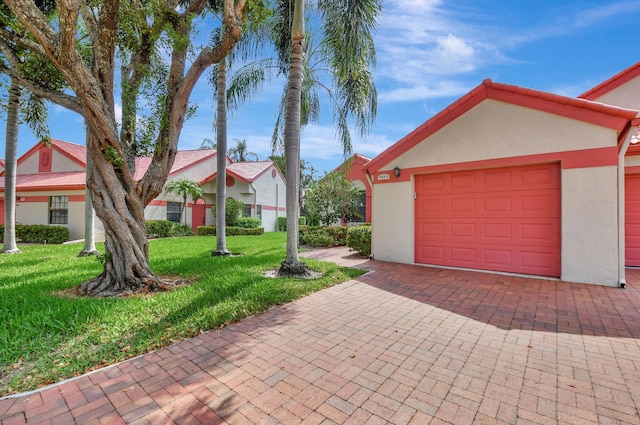 7644 Lexington Club Blvd Unit A, Delray Beach, FL 33446 - garage with decorative driveway