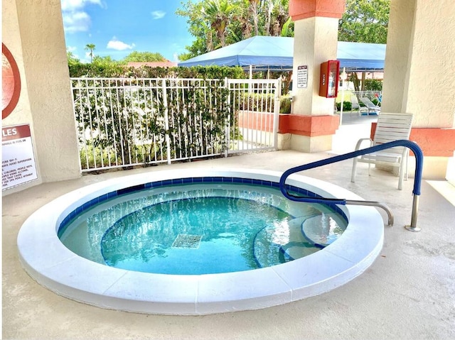 7644 Lexington Club Blvd Unit A, Delray Beach, FL 33446 - view of pool featuring a hot tub