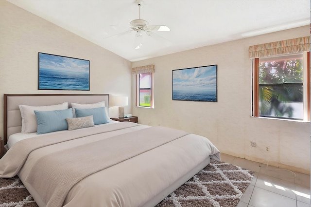 7644 Lexington Club Blvd Unit A, Delray Beach, FL 33446 - bedroom featuring vaulted ceiling, tile patterned floors, and a ceiling fan
