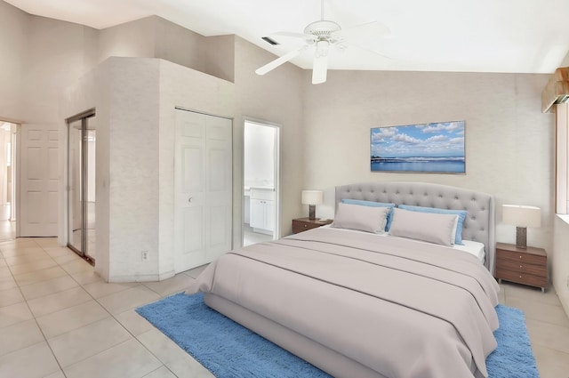 7644 Lexington Club Blvd Unit A, Delray Beach, FL 33446 - bedroom featuring light tile patterned floors, ceiling fan, ensuite bath, a towering ceiling, and a closet