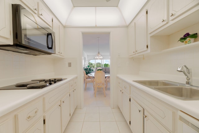105 NE 19th Ave Unit 356, Deerfield Beach, FL 33441 - kitchen featuring a sink, decorative backsplash, light tile patterned floors, dishwasher, and light countertops