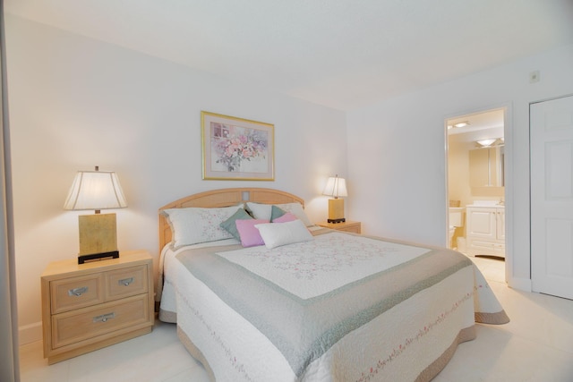 105 NE 19th Ave Unit 356, Deerfield Beach, FL 33441 - bedroom with ensuite bathroom and light tile patterned flooring