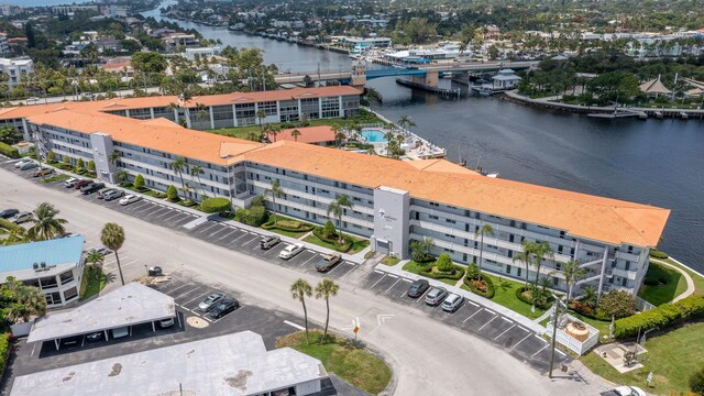 105 NE 19th Ave Unit 356, Deerfield Beach, FL 33441 - drone / aerial view of a nearby body of water, a notable bridge, and apartment complex / building