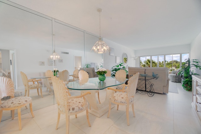 105 NE 19th Ave Unit 356, Deerfield Beach, FL 33441 - dining space with a chandelier