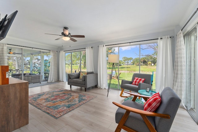 2948 SE Treasure Island Rd, Port Saint Lucie, FL 34952 - sunroom / solarium featuring crown molding and wood finished floors