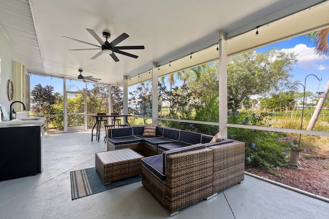2948 SE Treasure Island Rd, Port Saint Lucie, FL 34952 - sunroom / solarium with a sink, outdoor lounge area, and ceiling fan