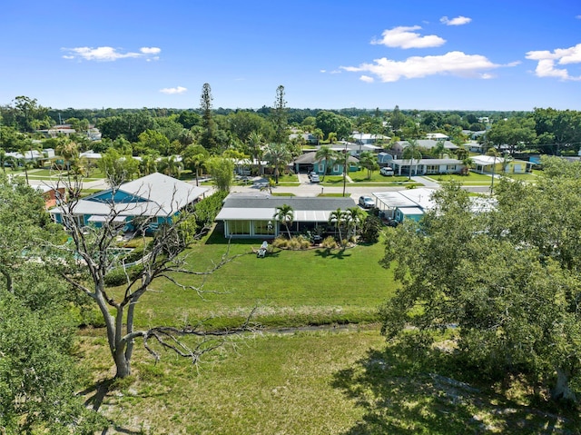 2948 SE Treasure Island Rd, Port Saint Lucie, FL 34952 - aerial view of residential area featuring a tree filled landscape