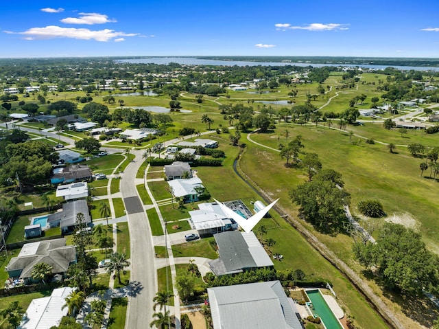 2948 SE Treasure Island Rd, Port Saint Lucie, FL 34952 - aerial overview of property's location with a large body of water and nearby suburban area