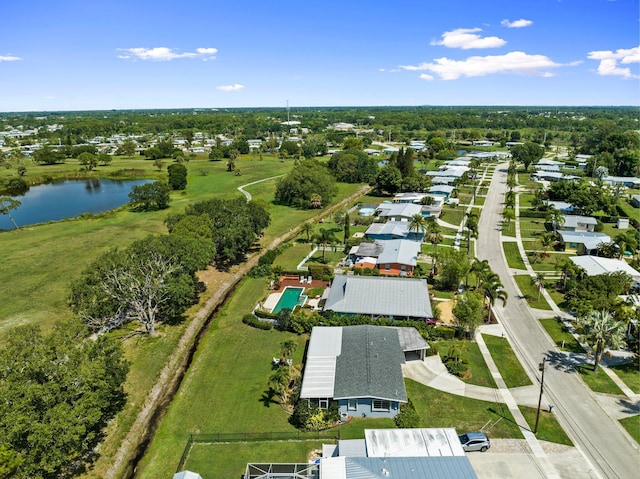 2948 SE Treasure Island Rd, Port Saint Lucie, FL 34952 - view of property location featuring a nearby body of water, a tree filled landscape, and nearby suburban area