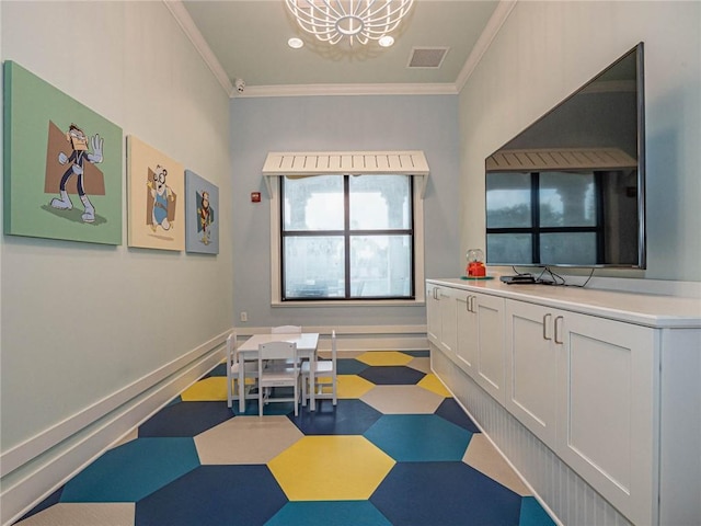 1095 N Verona Trace Dr, Vero Beach, FL 32966 - playroom featuring tile patterned floors, a chandelier, and ornamental molding