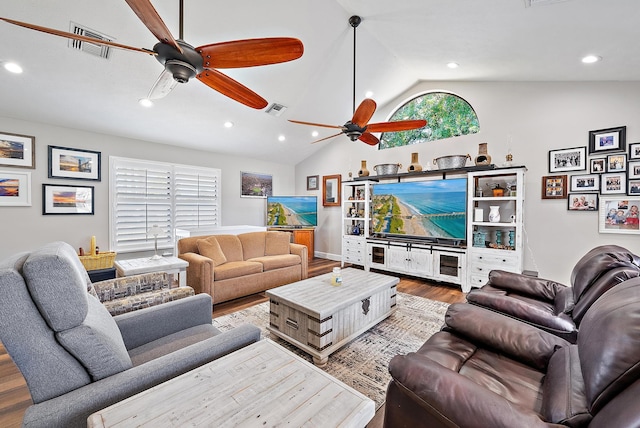 407 SE Duff Ct, Port Saint Lucie, FL 34984 - living area featuring vaulted ceiling, wood finished floors, ceiling fan, and recessed lighting