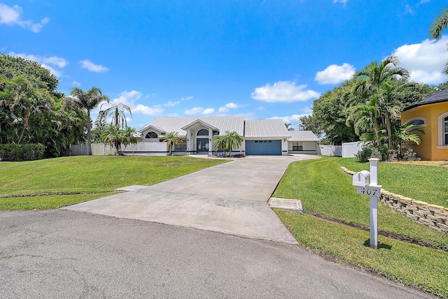 407 SE Duff Ct, Port Saint Lucie, FL 34984 - single story home with driveway and a garage