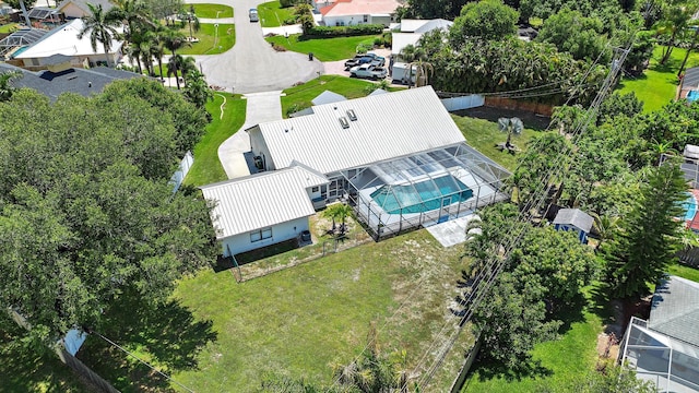 407 SE Duff Ct, Port Saint Lucie, FL 34984 - aerial perspective of suburban area featuring a pool area