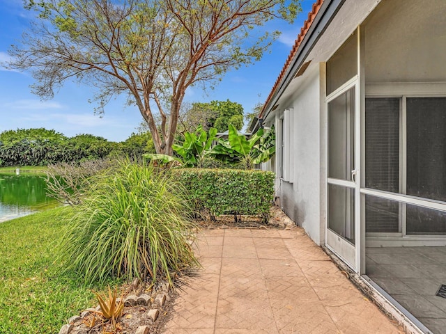 18458 Via Di Sorrento, Boca Raton, FL 33496 - view of patio / terrace with a water view