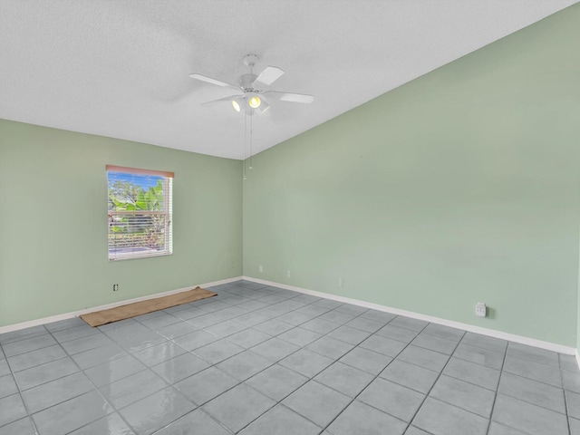 18458 Via Di Sorrento, Boca Raton, FL 33496 - spare room with a ceiling fan, baseboards, and light tile patterned flooring