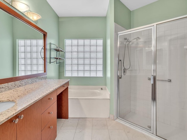 18458 Via Di Sorrento, Boca Raton, FL 33496 - full bathroom featuring vanity, a garden tub, and a shower stall