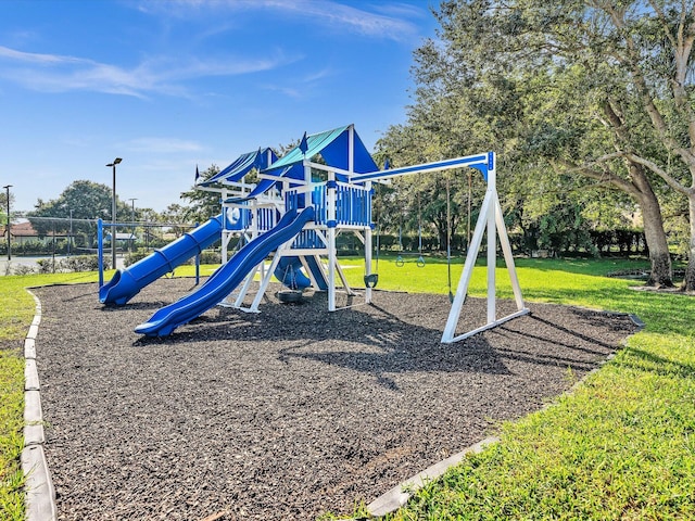 18458 Via Di Sorrento, Boca Raton, FL 33496 - community jungle gym featuring a lawn