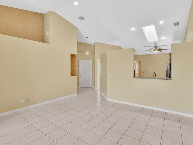 18458 Via Di Sorrento, Boca Raton, FL 33496 - spare room with a skylight, lofted ceiling, baseboards, recessed lighting, and ceiling fan