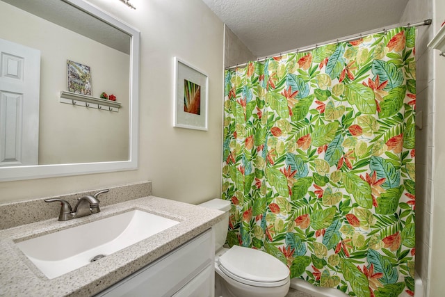 188 Wandering Trl, Jupiter, FL 33458 - full bathroom featuring vanity, toilet, a textured ceiling, and a shower with shower curtain