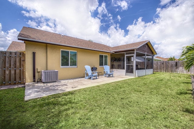 188 Wandering Trl, Jupiter, FL 33458 - rear view of property with central air condition unit, a sunroom, a patio, and stucco siding