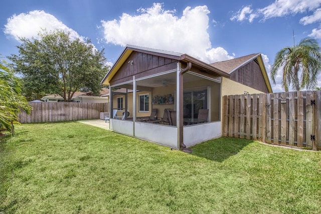 188 Wandering Trl, Jupiter, FL 33458 - rear view of property with ceiling fan and a sunroom