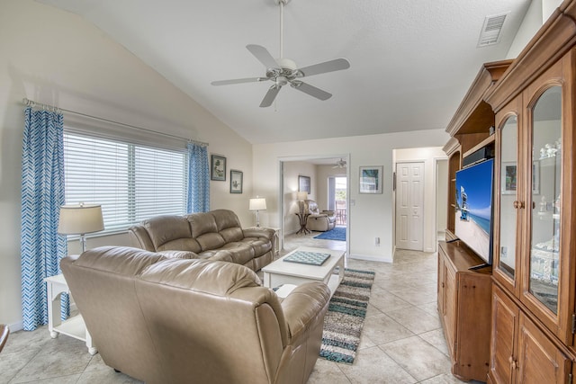 188 Wandering Trl, Jupiter, FL 33458 - living area featuring ceiling fan, lofted ceiling, light tile patterned floors, and baseboards