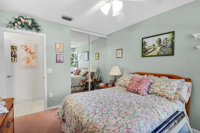 5196 Europa Dr Unit D, Boynton Beach, FL 33437 - bedroom featuring a closet, a ceiling fan, and carpet floors