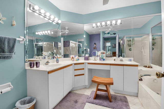 5196 Europa Dr Unit D, Boynton Beach, FL 33437 - bathroom featuring ceiling fan, a stall shower, double vanity, and a garden tub