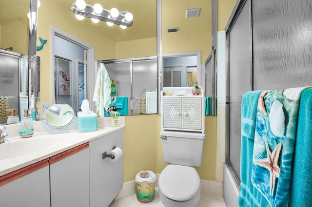 5196 Europa Dr Unit D, Boynton Beach, FL 33437 - bathroom with vanity, toilet, baseboards, and tile patterned flooring