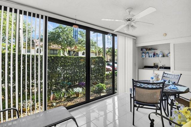 5196 Europa Dr Unit D, Boynton Beach, FL 33437 - sunroom / solarium featuring a ceiling fan and independent washer and dryer