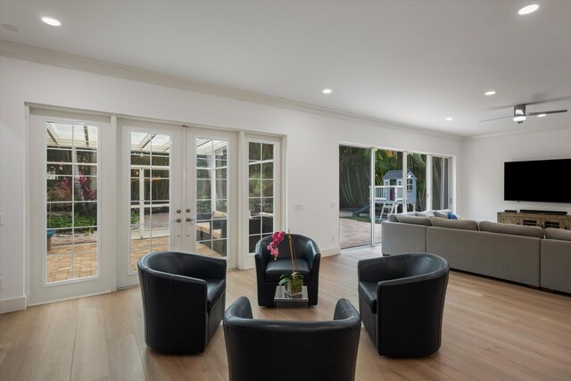 1770 Flagler Manor Cir, West Palm Beach, FL 33411 - living area featuring french doors, crown molding, light wood-style floors, recessed lighting, and baseboards