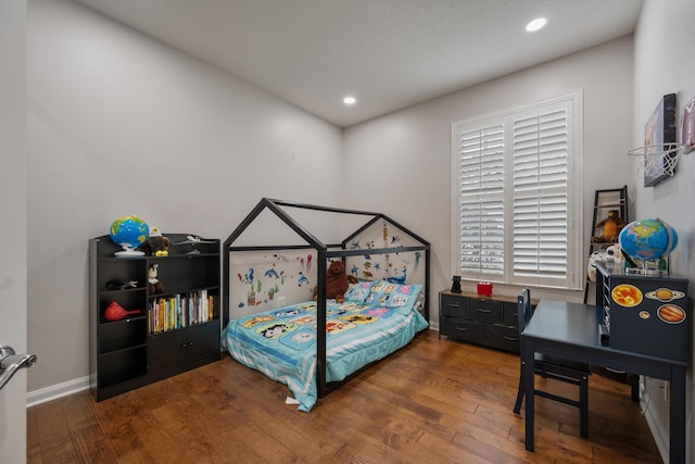 1770 Flagler Manor Cir, West Palm Beach, FL 33411 - bedroom with hardwood / wood-style floors, recessed lighting, and baseboards