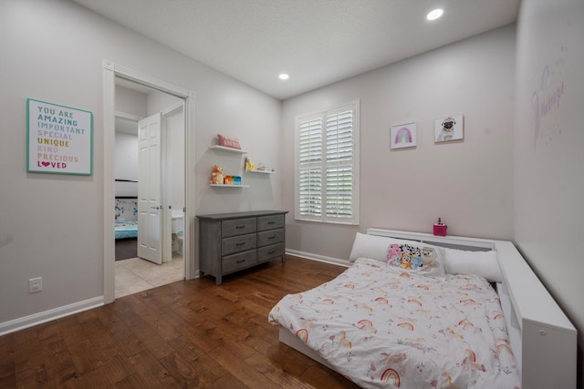 1770 Flagler Manor Cir, West Palm Beach, FL 33411 - bedroom with wood finished floors, baseboards, and recessed lighting
