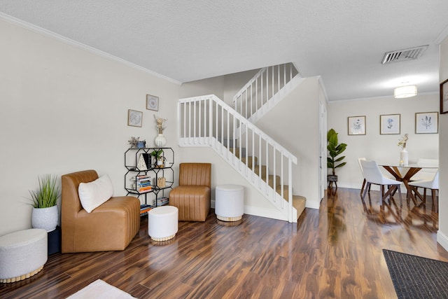 3110 Kingston Ct, West Palm Beach, FL 33409 - sitting room with stairs, crown molding, wood finished floors, and baseboards