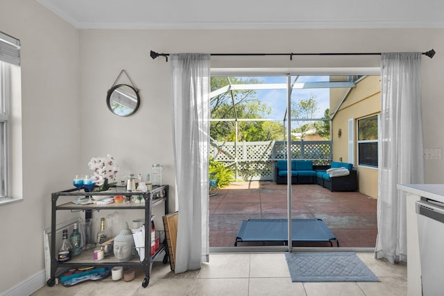 3110 Kingston Ct, West Palm Beach, FL 33409 - doorway to outside featuring ornamental molding and tile patterned floors